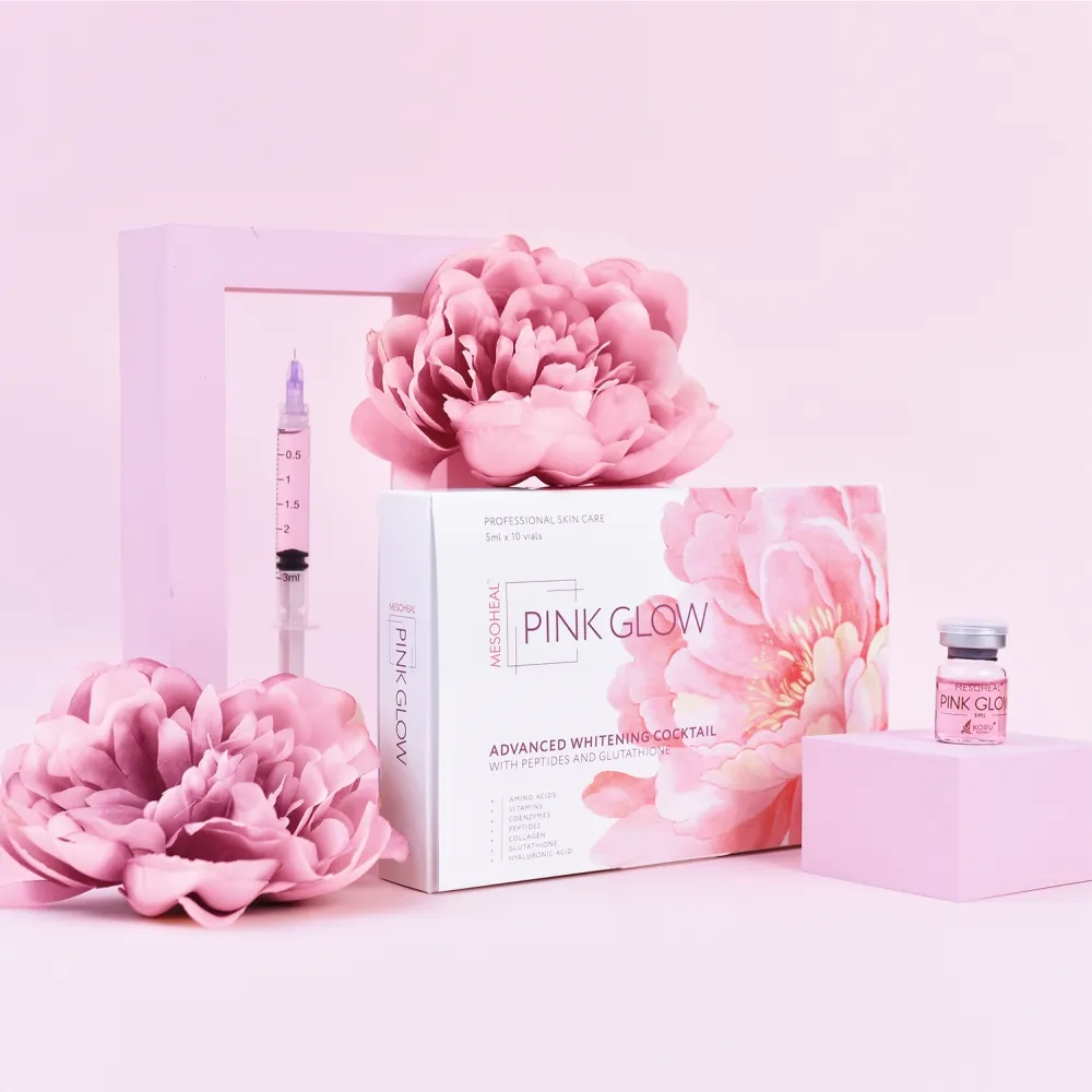 Zestaw Mesoheal Pink Glow — opakowanie, ampułka i strzykawka na różowym tle z piwoniami